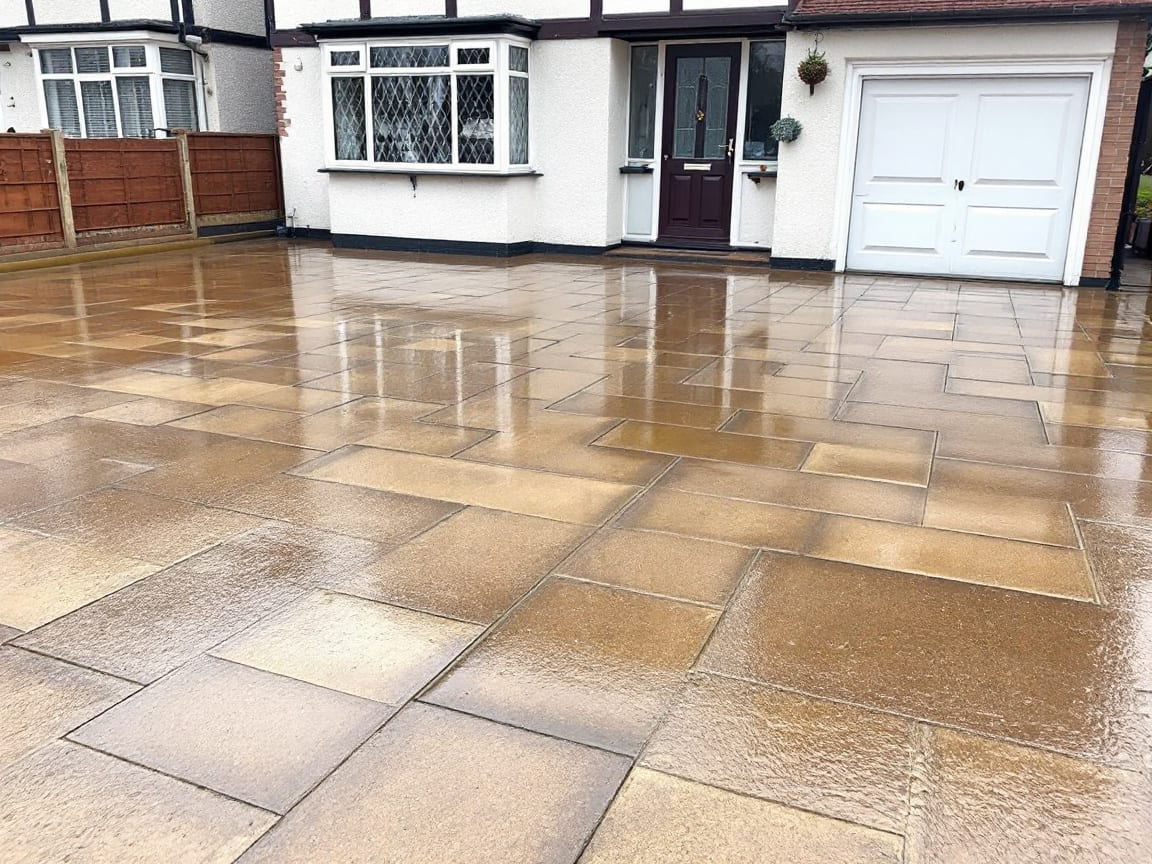 The same block paving bright and clean after jet washing
