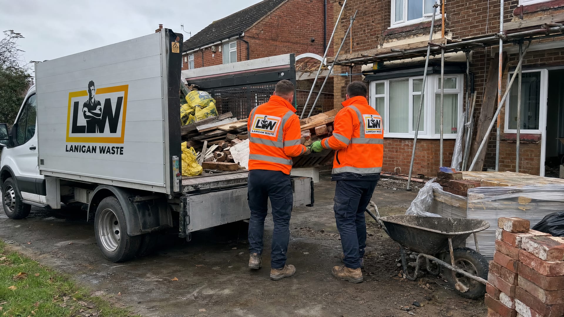 Lanigan Waste crew collecting renovation and builders' waste in Weybridge