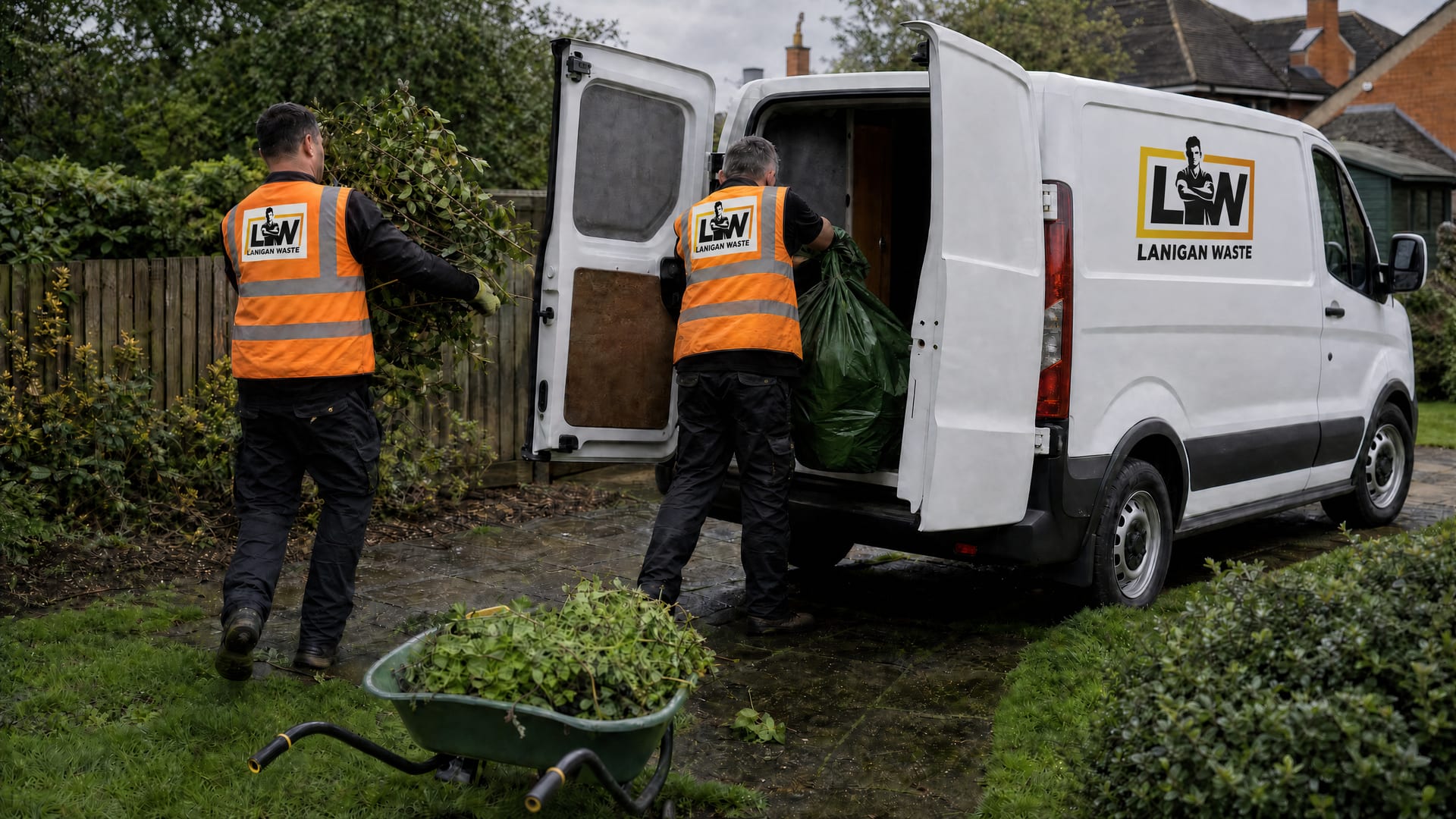 Lanigan Waste crew loading green garden waste into their branded van