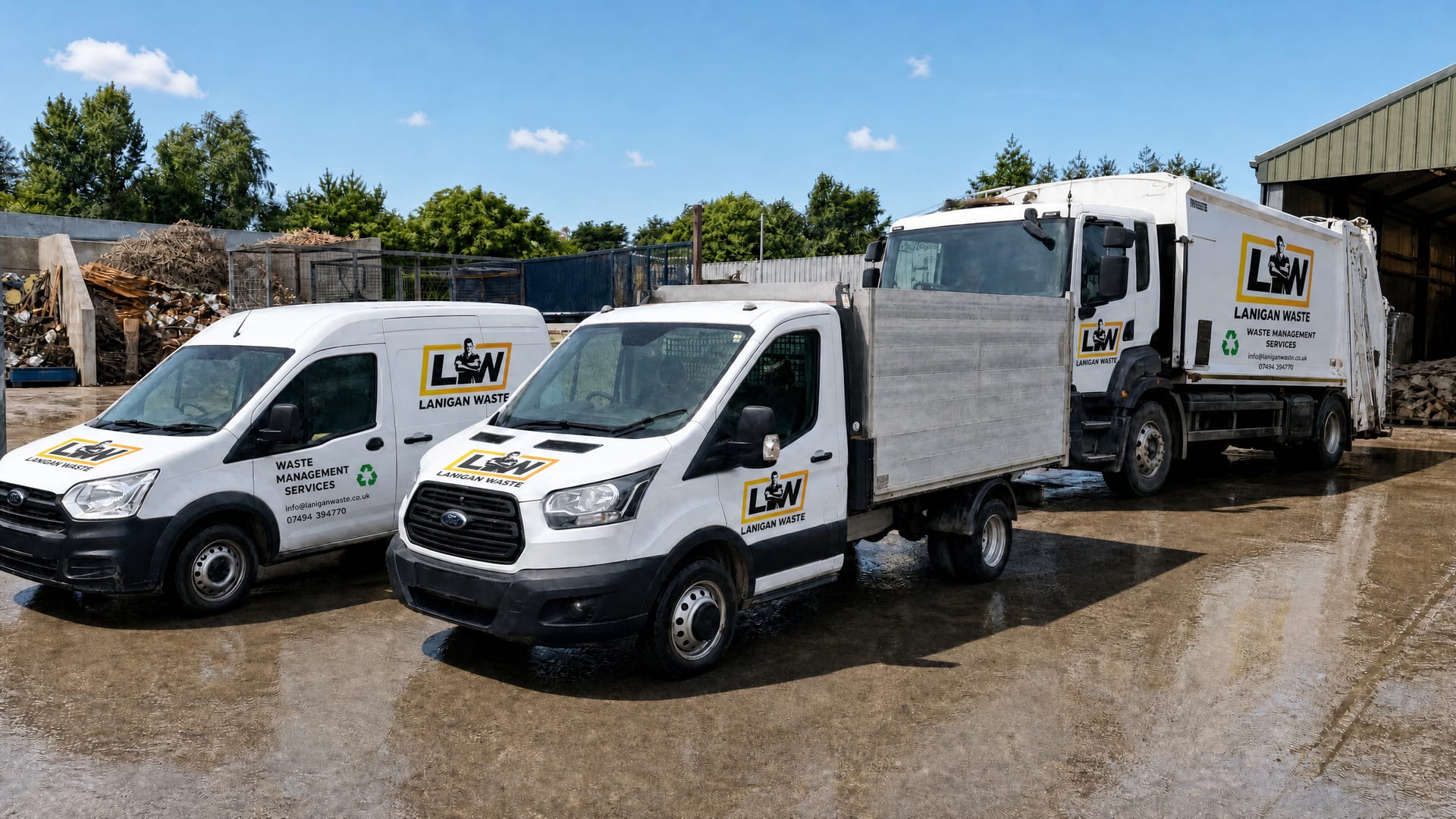 The Lanigan Waste fleet of sign-written vans and tipper parked up in Hampton on a sunny day